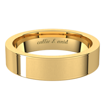 Anid 5mm band in yellow gold with engraving mockup 2